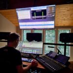 Todd Hooge at the mixing desk running an ADR session in the Dolby Atmos control room at Sonic Forest Studios